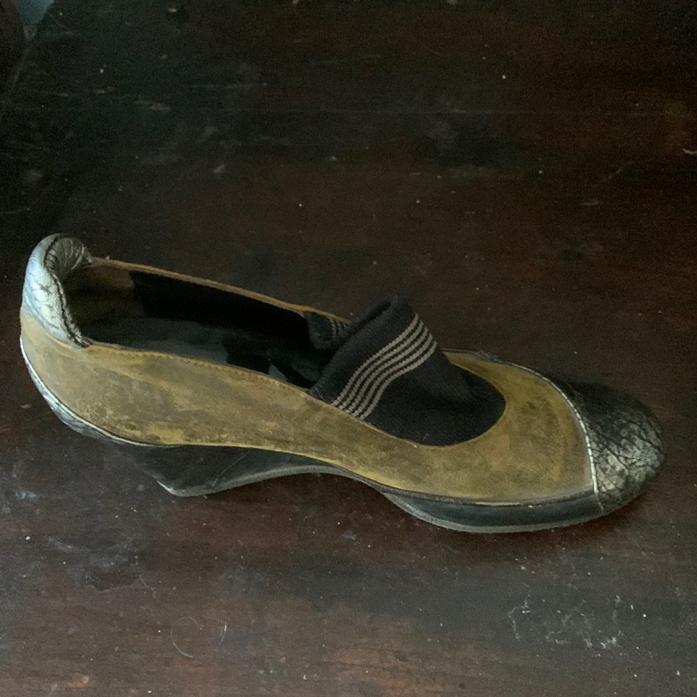 Dress shoe. Size 9.5. 10.5 inches inside from toe to heel black, silver leather